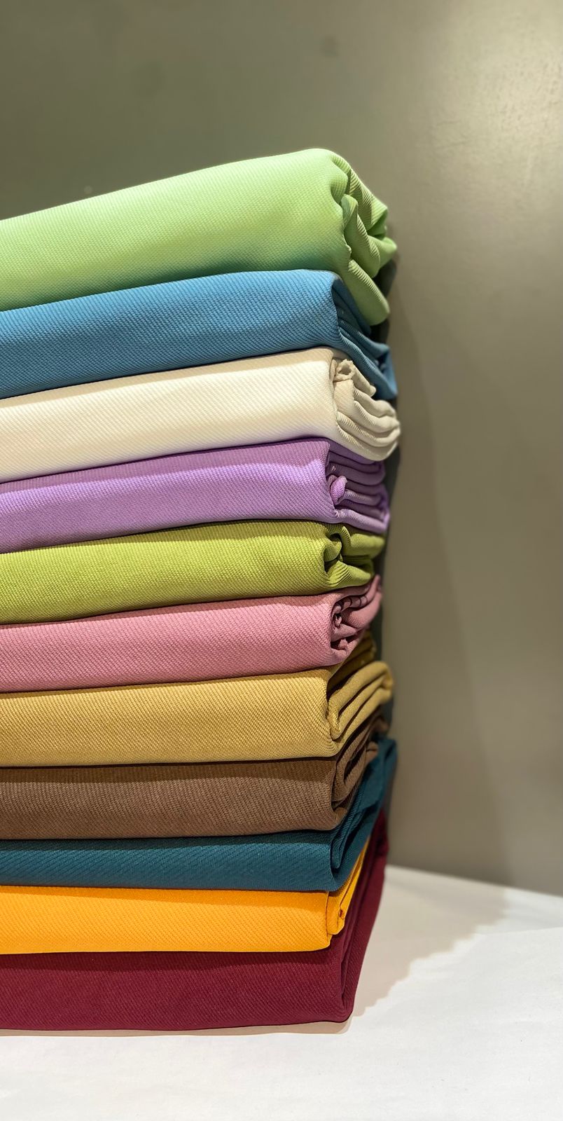 Stack of folded premium fabrics